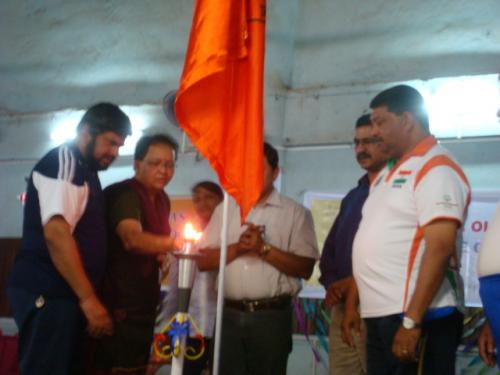 03 mr. victor and luis seen with mrs . kandolkar at the opening ceremony of goa state badminton games